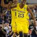 Michigan freshman Glenn Robinson III and freshman Caris LeVert celebrate beating No.1 seed Kansas, 87-85 in overtime of their Sweet 16 match up at Cowboys Stadium in Arlington, Texas on March 29, 2013. Melanie Maxwell I AnnArbor.com